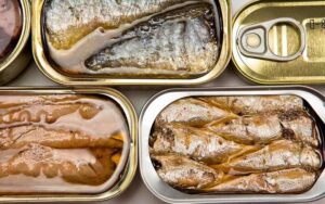 Рыбные консервы в ассортименте компании "Северные морепродукты" в продаже в СПб
